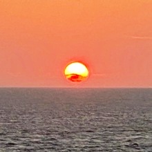 Zonsondergang aan zee