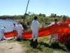 Deployment of a containment boom